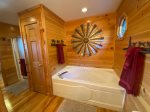 Loft Master Bathroom with a Large Shower Stall and Jetted Garden Tub